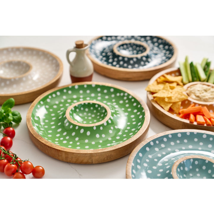 featuring a white polka dot design.
