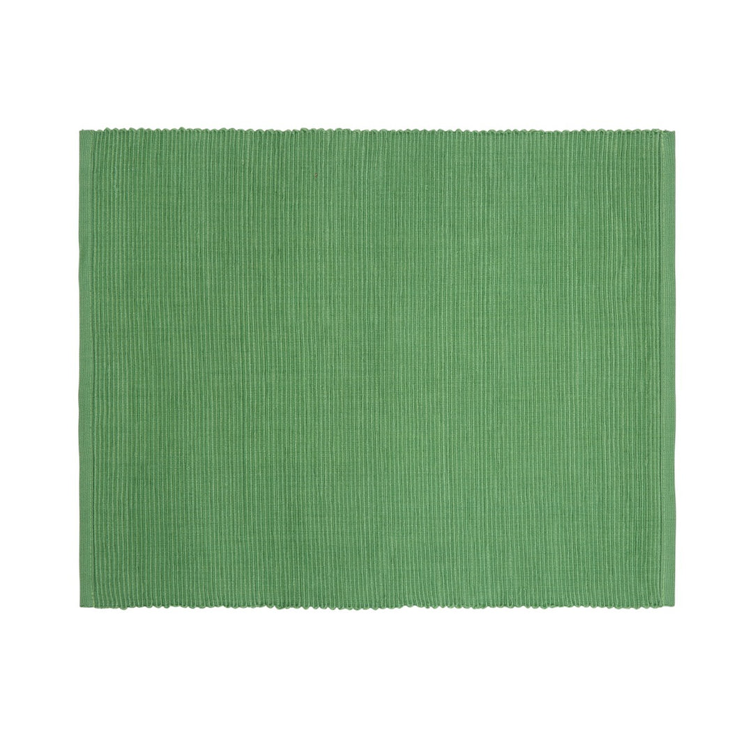 featuring a white polka dot pattern on the napkin. Made from cotton and recycled cotton.