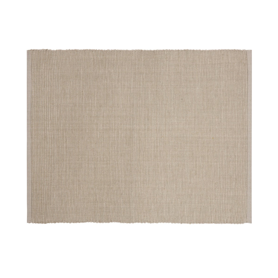 featuring a white polka dot pattern on the napkin. Made from cotton and recycled cotton.