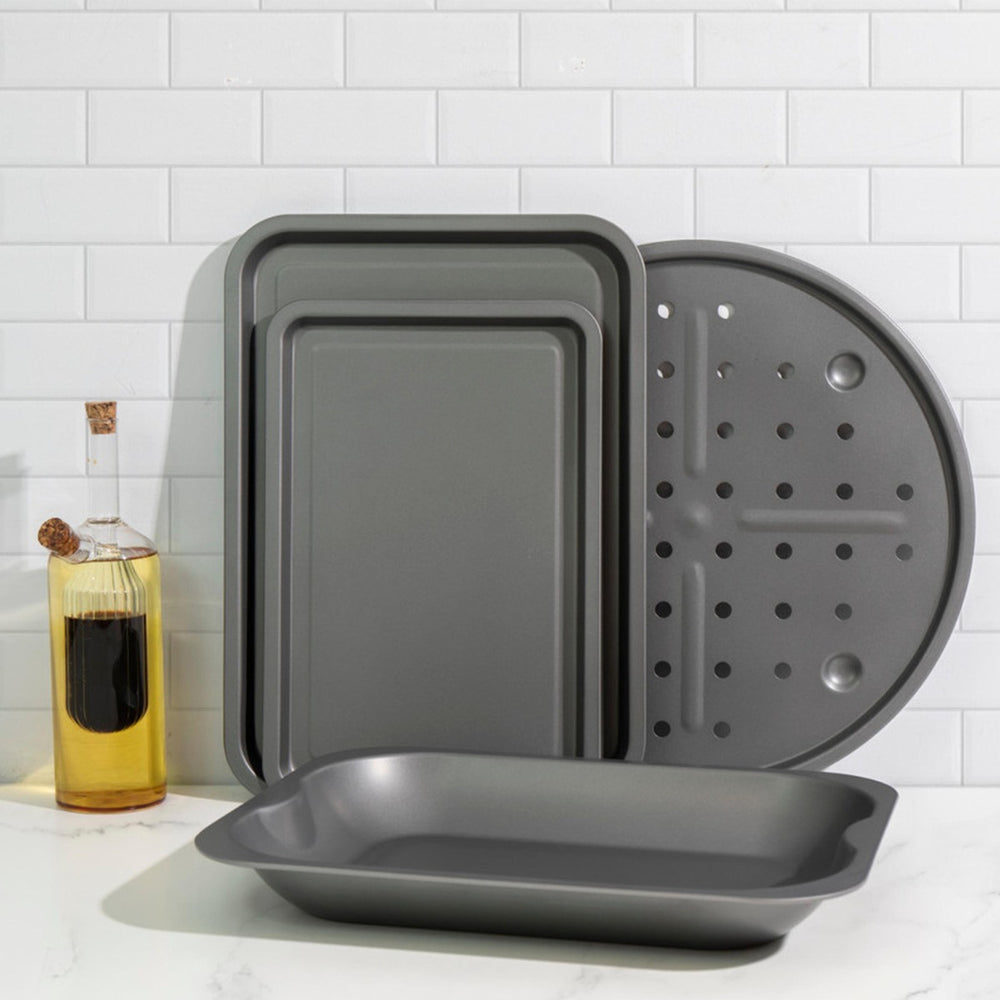  a pizza tray and a roasting dish