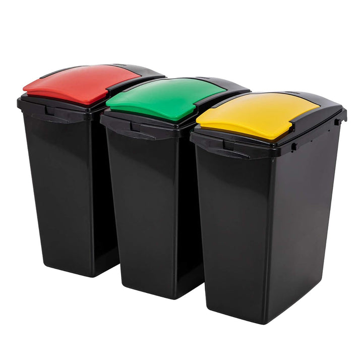 a set of three large recycling bins, with a red, green and yellow lid