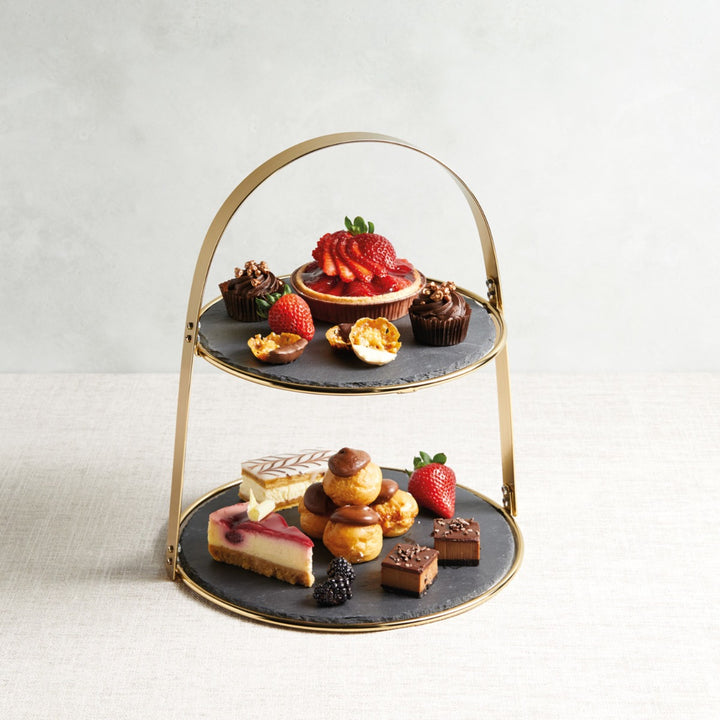 serving stand with display of cakes and treats