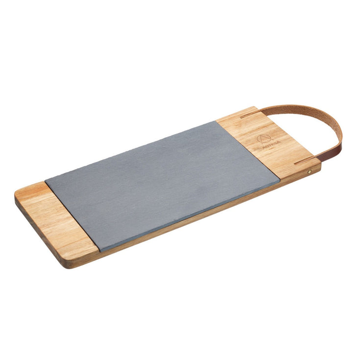 Acacia wood serving board with a removable slate platter and a leather strap handle.