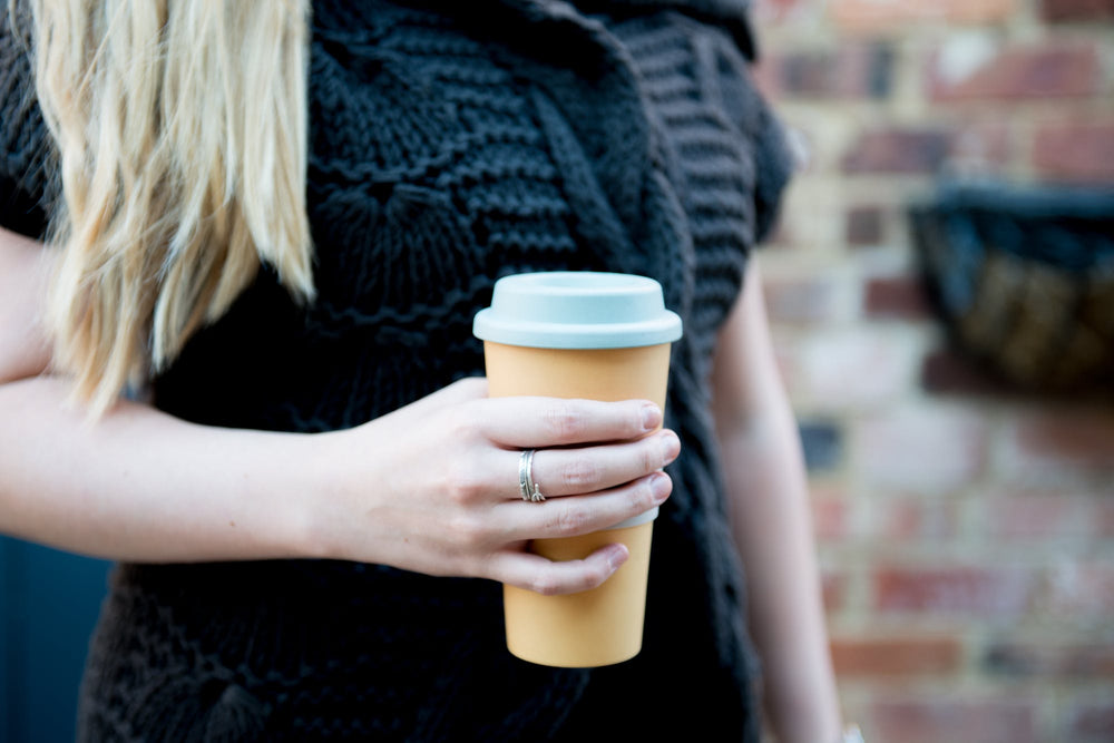 Large reusable travel cup in pastels colours
