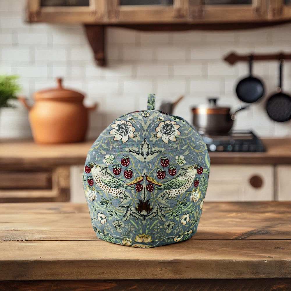  featuring the William Morris Strawberry Thief on a pale blue background.