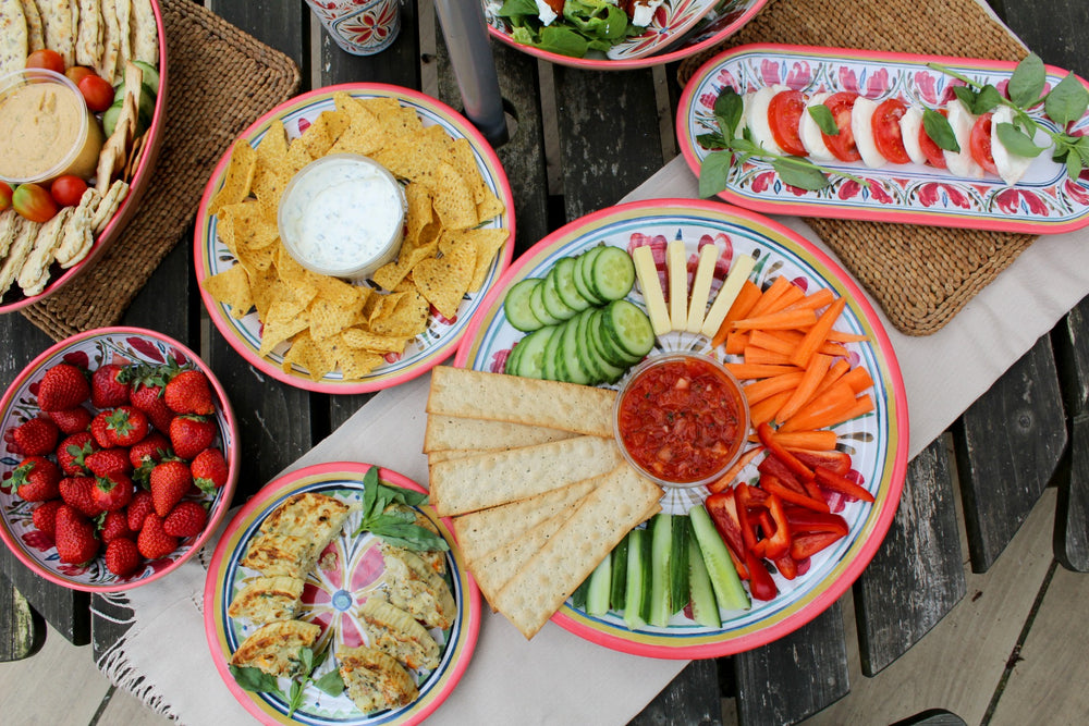 melamine plates and bowls with salads