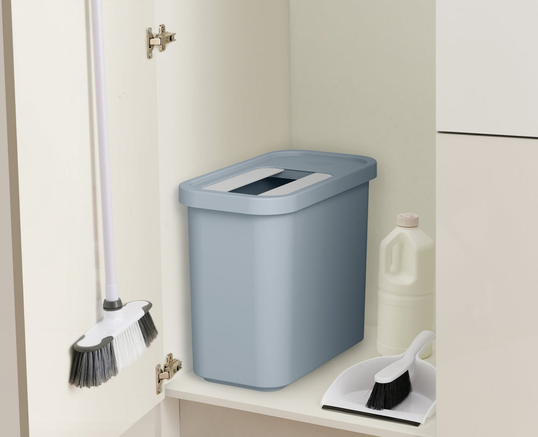 Compact grey recycling bin for storing waste