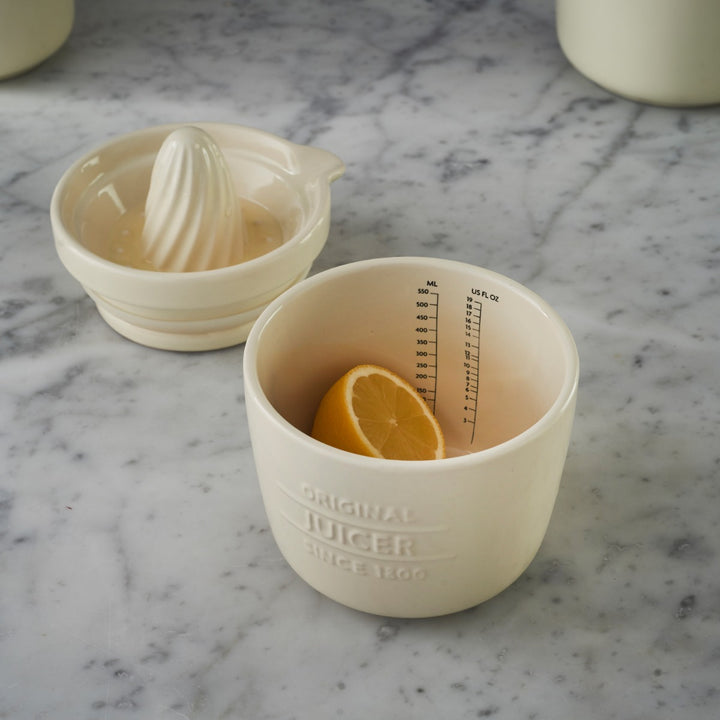 Perfectly sized hand juicer and jar for holding and measuring your juice