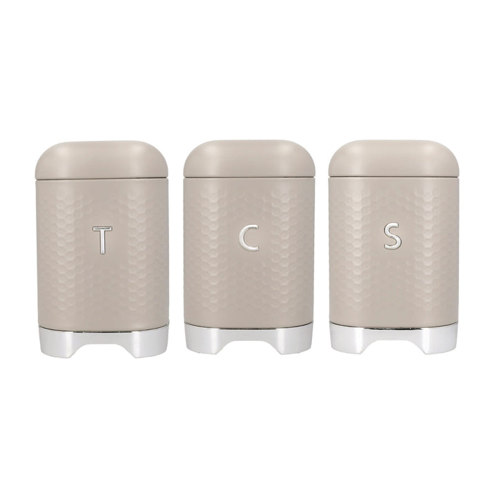 Beige coloured tea, coffee & sugar canisters with a bubble wrap like texture
