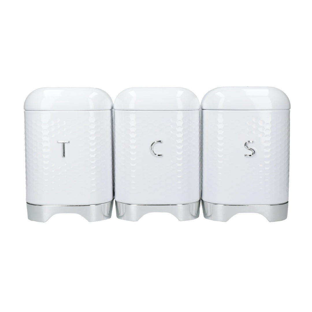 Textured white and silver storage canisters with letters to signify tea, coffee and sugar