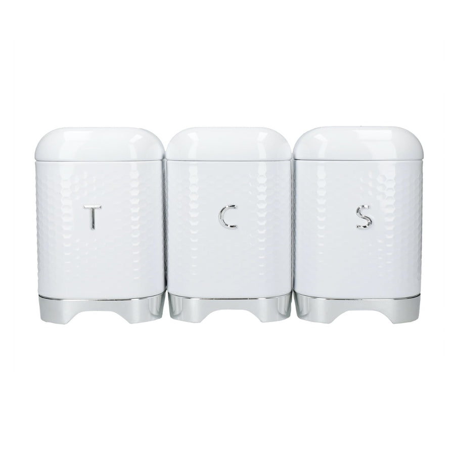 Textured white and silver storage canisters with letters to signify tea, coffee and sugar