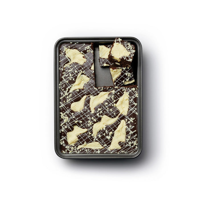 cooked chocolate brownies in metal baking pan