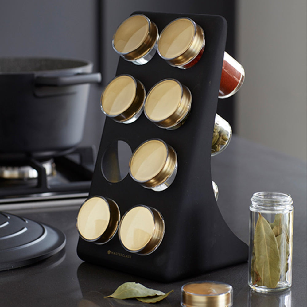 eight spice jars on black stand