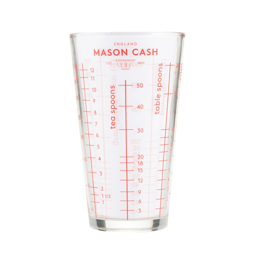 a mason cash glass cup with various cooking & baking measures
