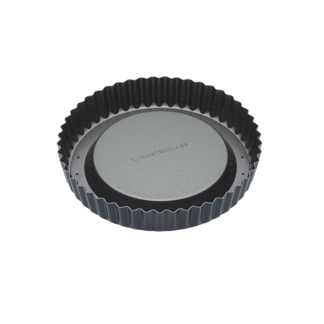 round fluted flan tin with loose, raised base and non-stick coating