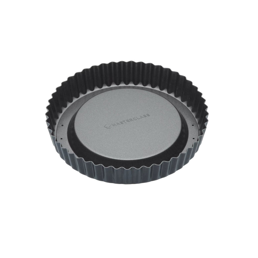 round fluted flan tin with loose, raised base and non-stick coating
