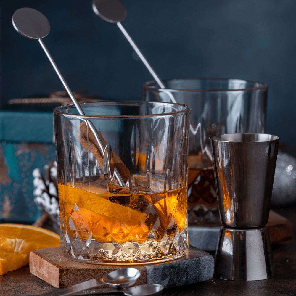  2 cocktail stirrers