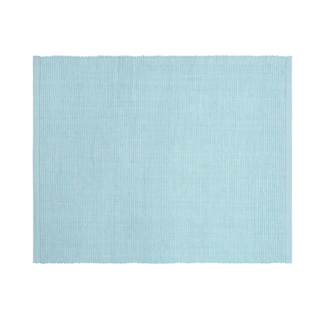 featuring a white polka dot pattern on the napkin. Made from cotton and recycled cotton.