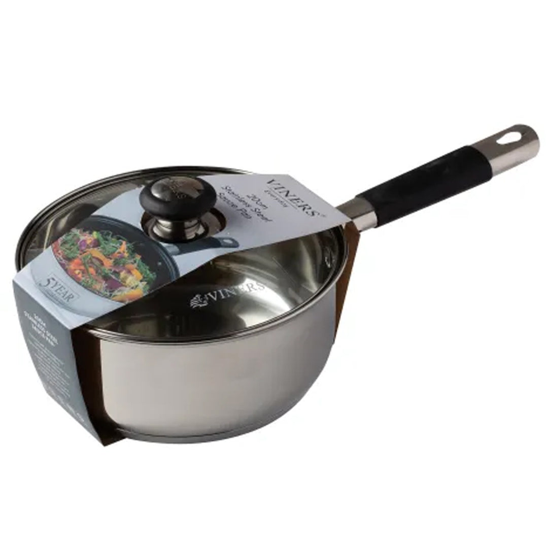 large stainless steel saucepan for cooking, with fitted glass lid